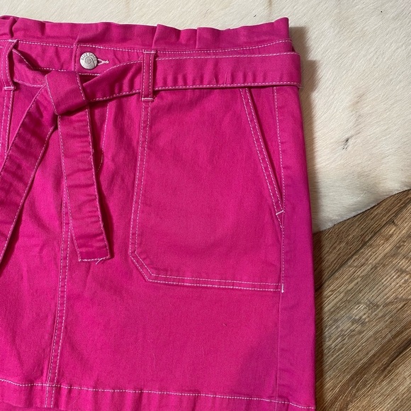 Blue Spice pink mini skirt with white stitching and a tie belt - Picture 2 of 8